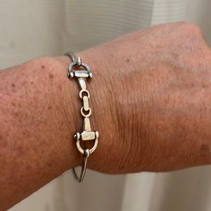 Silver toned equestrian two stirrup bracelet. Fits up to 7.5 wrist EUC